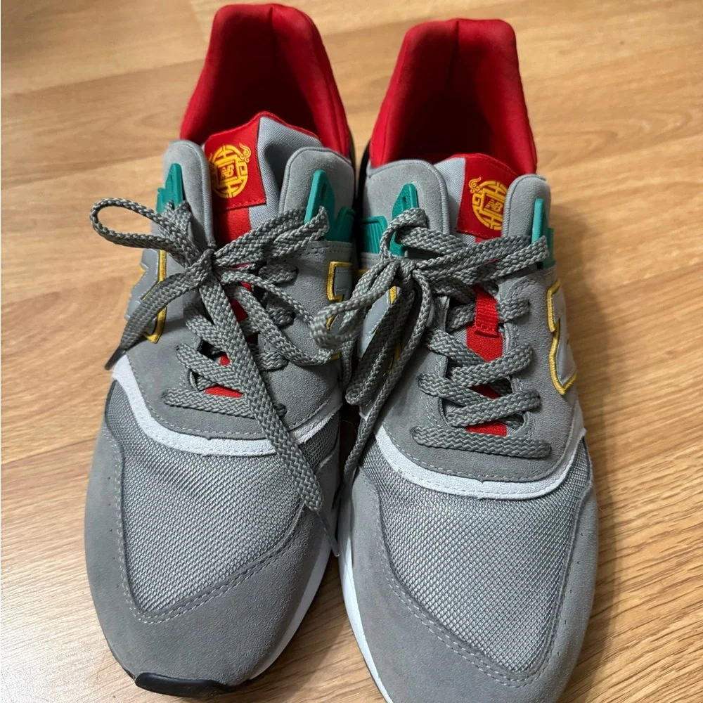 New Balance Gray Sneakers with Red, Green, and Yellow Accents - Picture 1 of 5